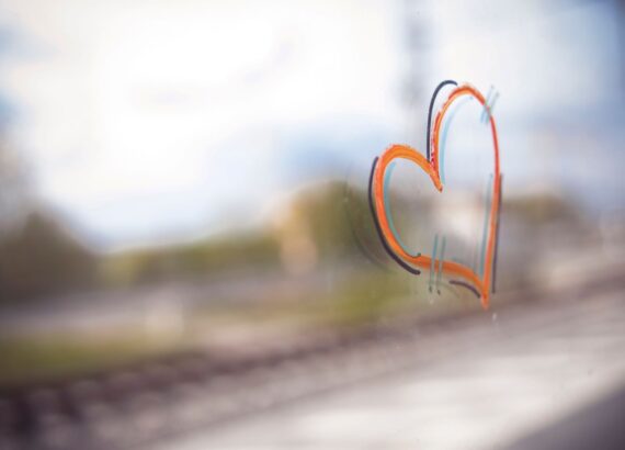 Heart drawn on a window representing the relationship affected by grief. Losing a loved one is a traumatic experience that can cause grief anxiety. If you are struggling with loss, grief counseling in North Carolina is here to help you navigate these complicated emotions.