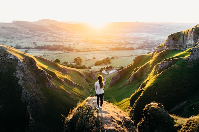 person standing on mountain in sunrise. anxiety treatment in NC