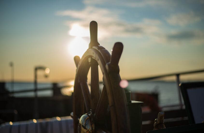 Steering wheel of a ship. Postpartum anxiety and OCD. Mental health support. Life transitions.