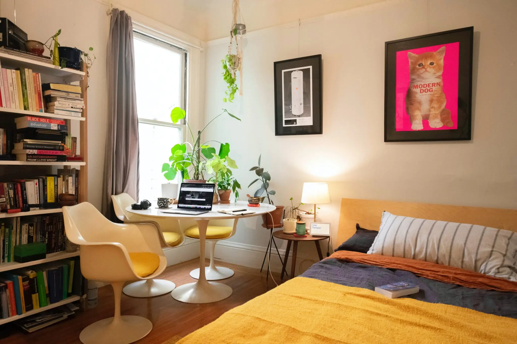 A cozy bedroom with a desk, chair, and a bed, perfect for online therapy sessions.