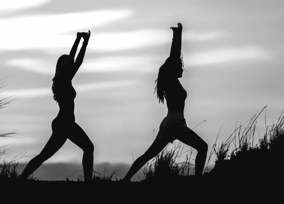 woman practicing yoga to release trauma